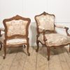 Pair of French Louis XV Style Carved Walnut Armchairs