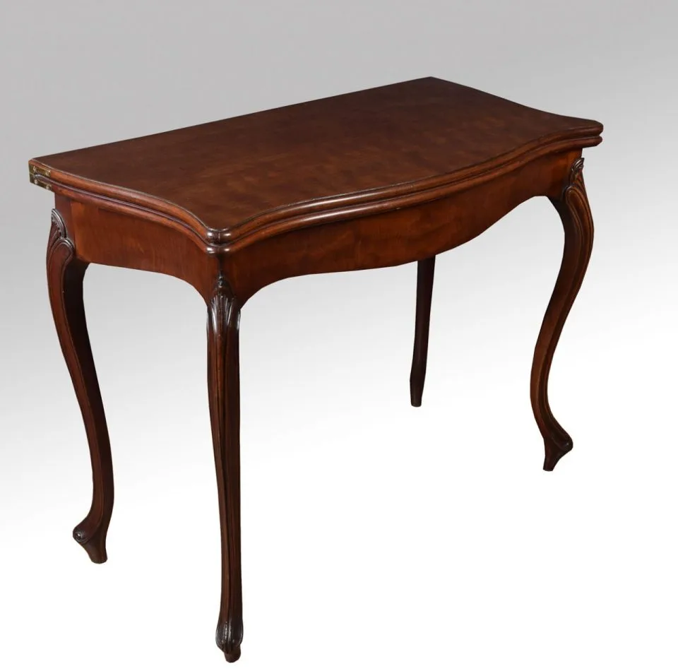 George III mahogany serpentine card table in the French Hepplewhite taste
