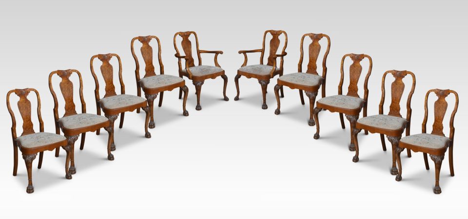 Set of ten walnut George II style dining chairs
