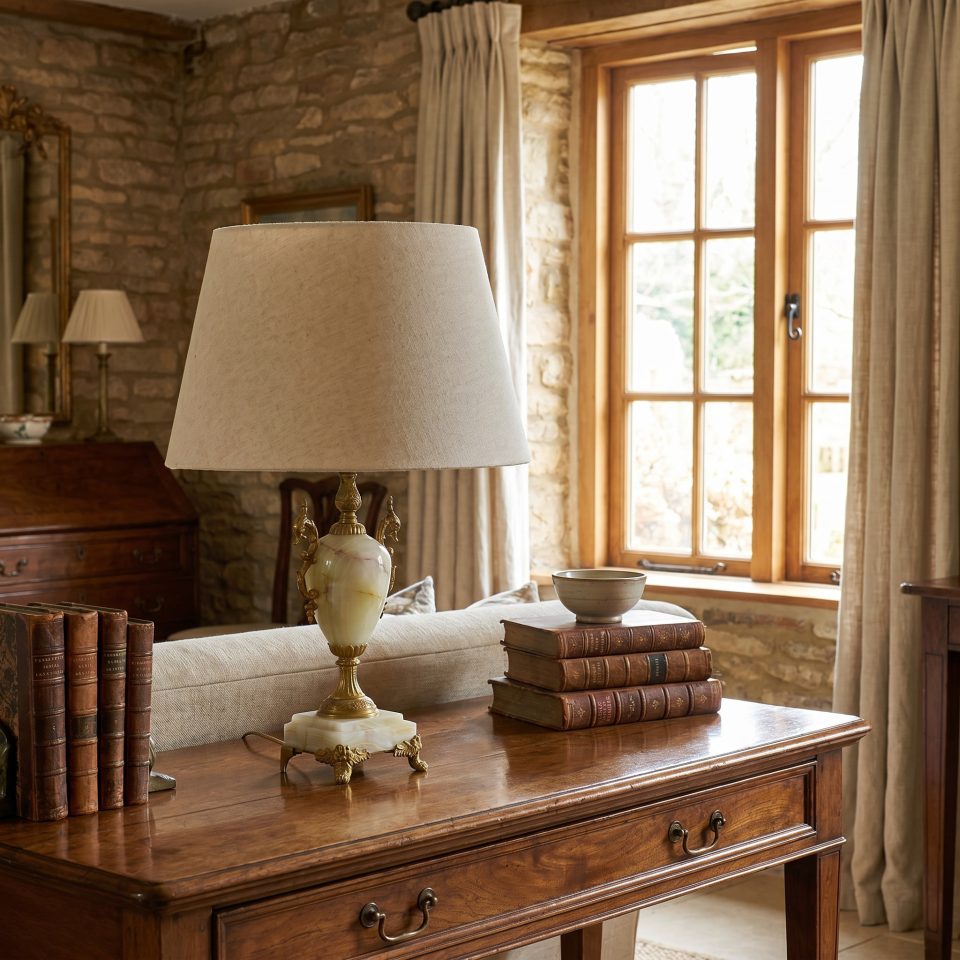 Metal mounted onyx table lamp