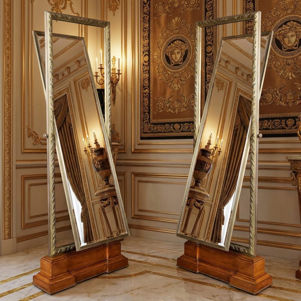 Pair of Versace Large tooled bronze framed two sided cheval mirrors