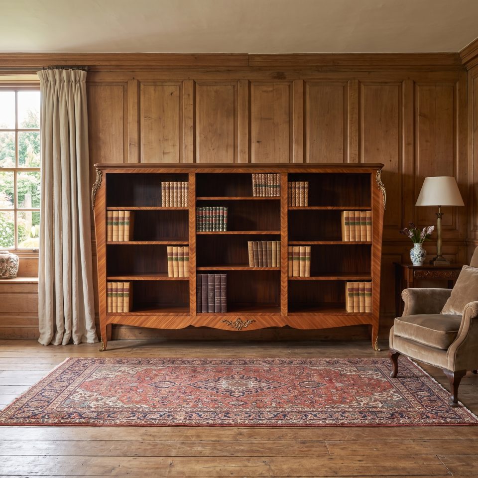 A Louis XV-style kingwood and gilt-metal mounted open bookcase