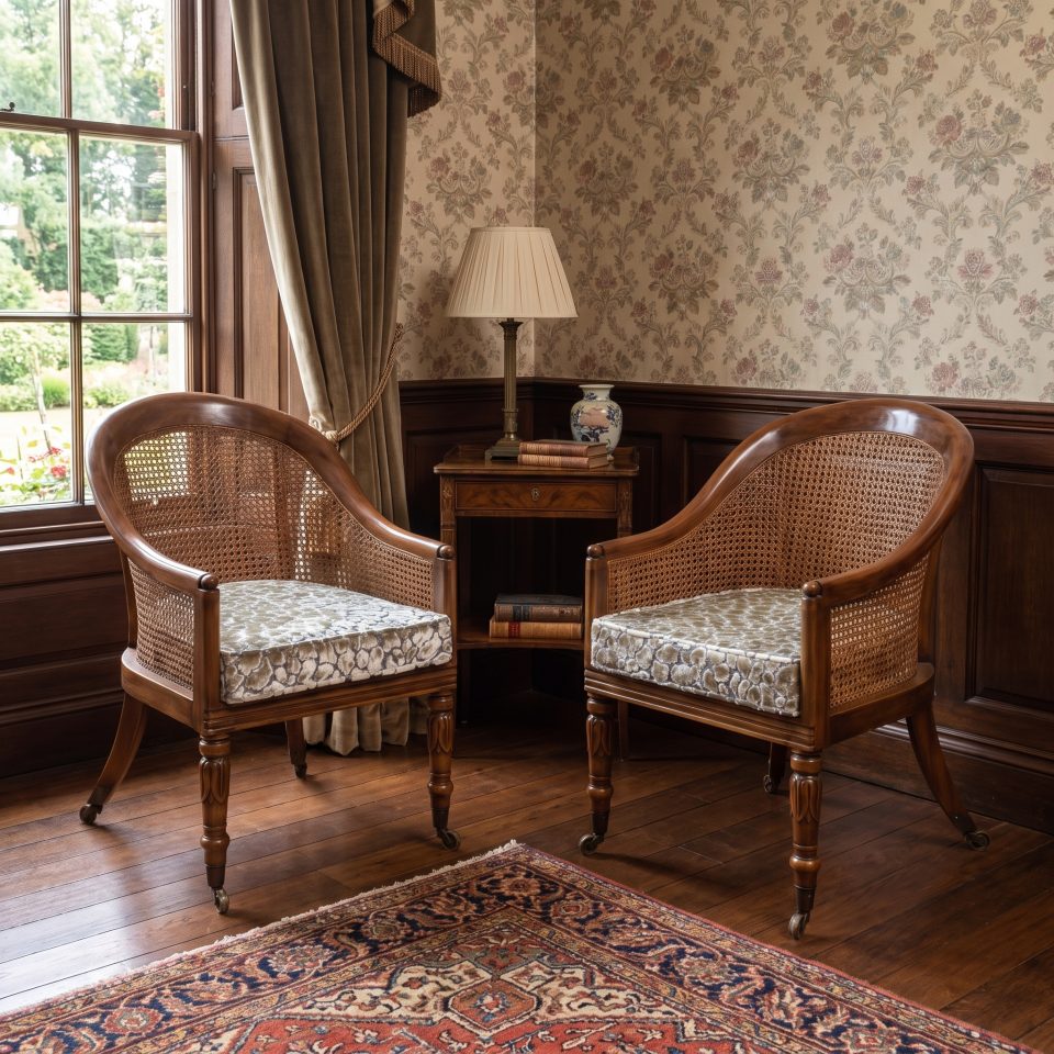 Pair of Regency style mahogany cane tub chairs