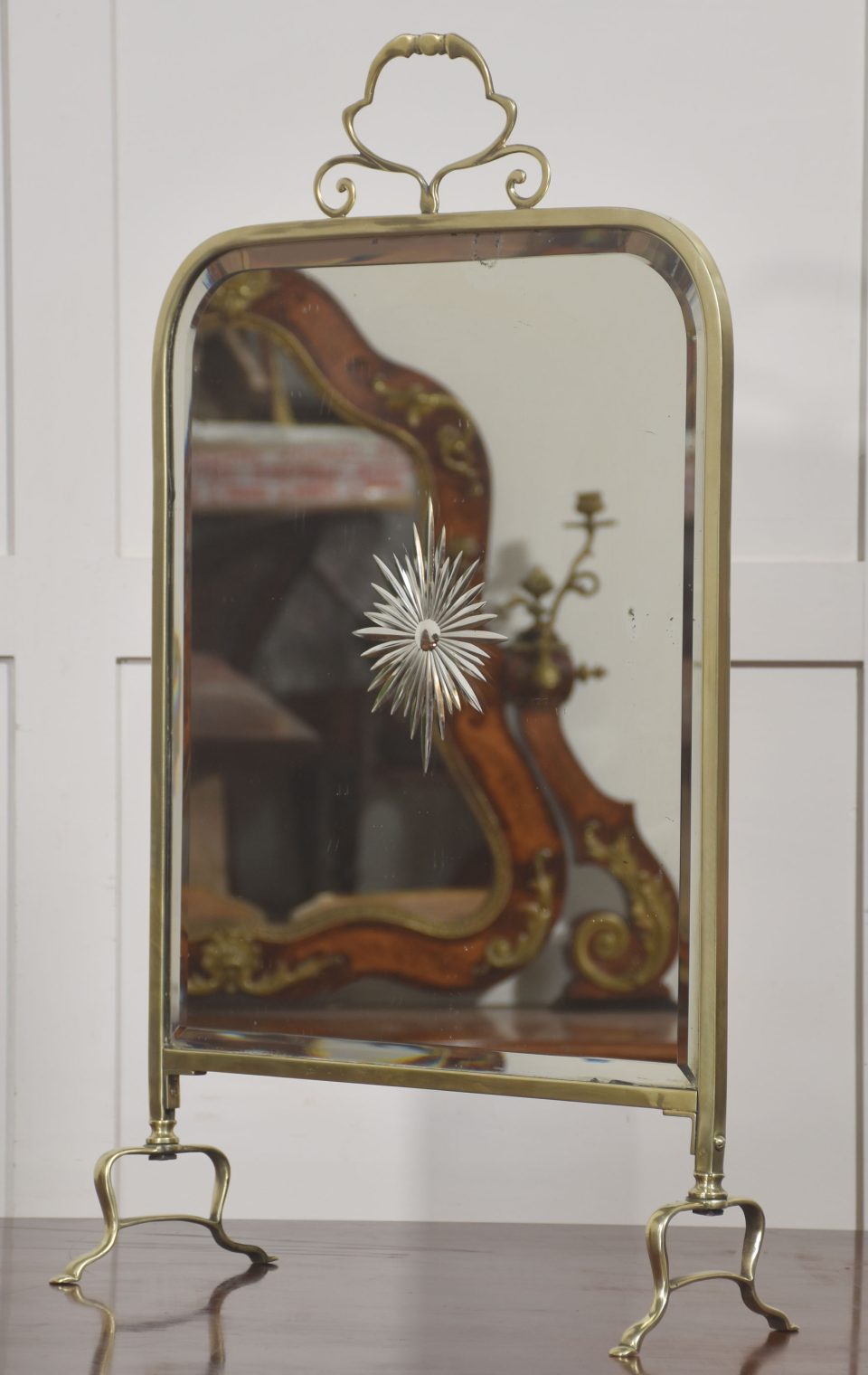 brass and mirrored glass fire screen