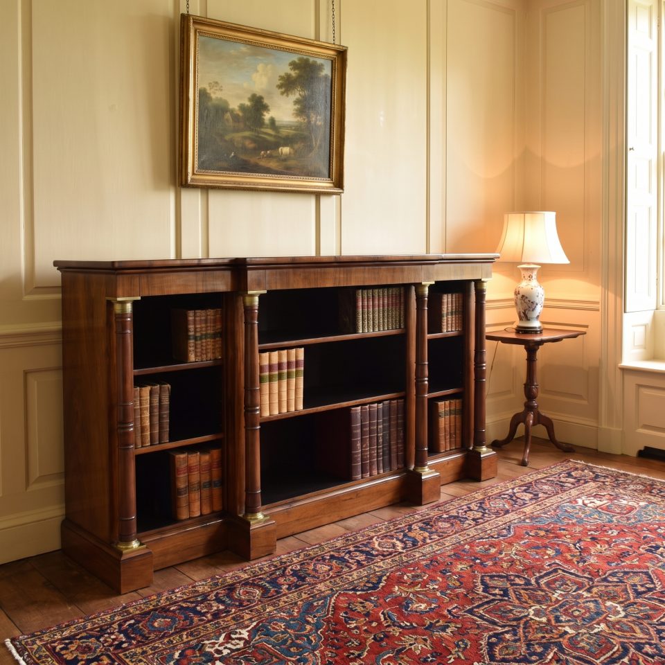 Regency rosewood and brass mounted breakfront open bookcase